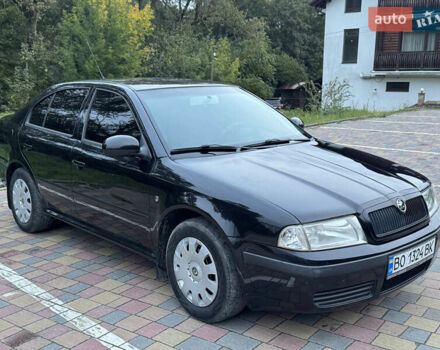 Черный Шкода Октавия, объемом двигателя 1.6 л и пробегом 225 тыс. км за 5650 $, фото 1 на Automoto.ua