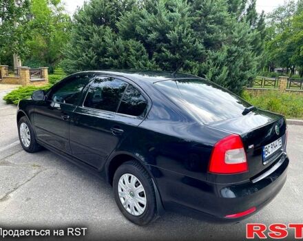 Черный Шкода Октавия, объемом двигателя 1.6 л и пробегом 127 тыс. км за 7600 $, фото 5 на Automoto.ua