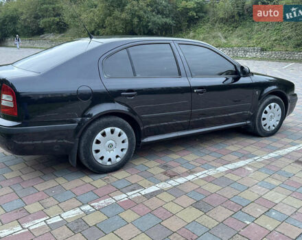 Черный Шкода Октавия, объемом двигателя 1.6 л и пробегом 225 тыс. км за 5650 $, фото 3 на Automoto.ua