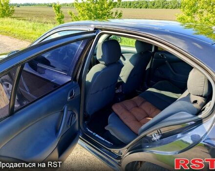 Черный Шкода Октавия, объемом двигателя 1.6 л и пробегом 245 тыс. км за 5500 $, фото 5 на Automoto.ua