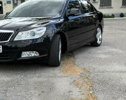 Черный Шкода Октавия, объемом двигателя 1.8 л и пробегом 230 тыс. км за 9300 $, фото 1 на Automoto.ua