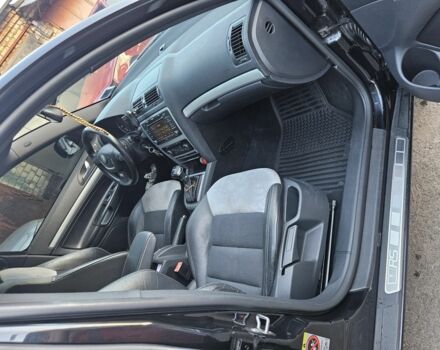 Черный Шкода Октавия, объемом двигателя 2 л и пробегом 253 тыс. км за 10000 $, фото 1 на Automoto.ua