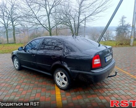 Черный Шкода Октавия, объемом двигателя 1.6 л и пробегом 239 тыс. км за 5500 $, фото 2 на Automoto.ua