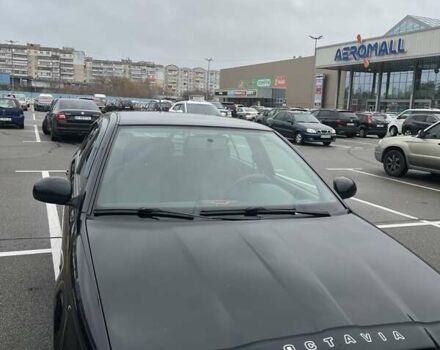 Черный Шкода Октавия, объемом двигателя 1.6 л и пробегом 216 тыс. км за 6500 $, фото 1 на Automoto.ua