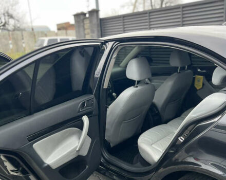 Чорний Шкода Октавія, об'ємом двигуна 2 л та пробігом 320 тис. км за 7800 $, фото 6 на Automoto.ua