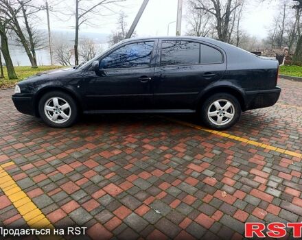 Черный Шкода Октавия, объемом двигателя 1.6 л и пробегом 239 тыс. км за 5500 $, фото 3 на Automoto.ua