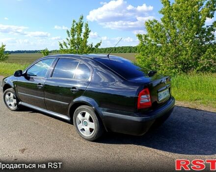 Черный Шкода Октавия, объемом двигателя 1.6 л и пробегом 245 тыс. км за 5500 $, фото 2 на Automoto.ua