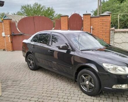 Черный Шкода Октавия, объемом двигателя 1.6 л и пробегом 210 тыс. км за 9400 $, фото 5 на Automoto.ua