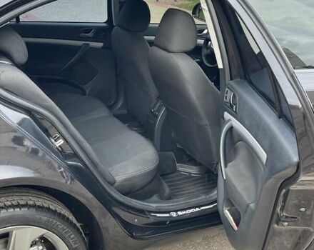 Чорний Шкода Октавія, об'ємом двигуна 1.8 л та пробігом 210 тис. км за 9600 $, фото 5 на Automoto.ua