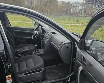 Черный Шкода Октавия, объемом двигателя 1.4 л и пробегом 207 тыс. км за 7500 $, фото 5 на Automoto.ua