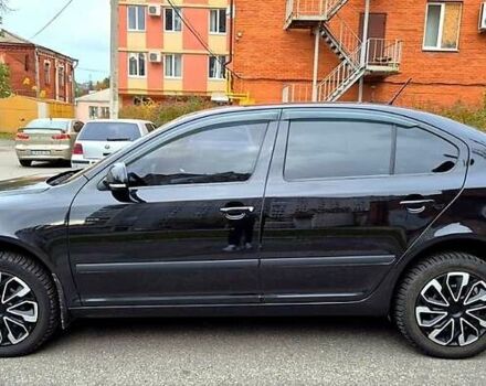 Чорний Шкода Октавія, об'ємом двигуна 2 л та пробігом 232 тис. км за 9800 $, фото 4 на Automoto.ua