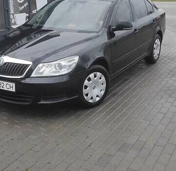 Шкода Октавия 2011 в Ужгороде на Automoto.ua Черный Шкода Октавия, объемом двигателя 1.6 л и пробегом 270 тыс. км за 7200 $, фото 2 на Automoto.ua