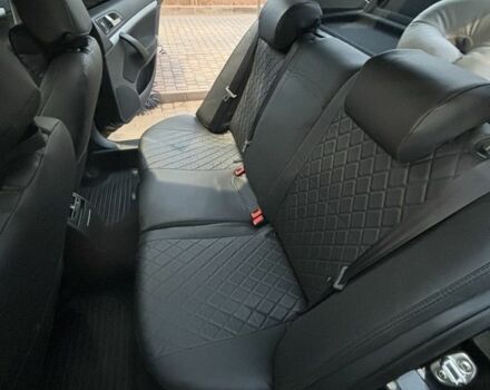 Черный Шкода Октавия, объемом двигателя 2 л и пробегом 260 тыс. км за 8800 $, фото 6 на Automoto.ua