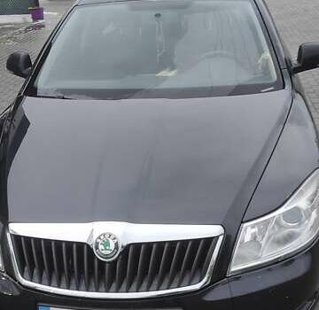 Шкода Октавия 2011 в Ужгороде на Automoto.ua Черный Шкода Октавия, объемом двигателя 1.6 л и пробегом 270 тыс. км за 7200 $, фото 6 на Automoto.ua