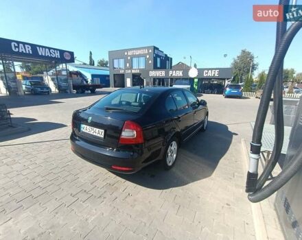 Чорний Шкода Октавія, об'ємом двигуна 1.6 л та пробігом 235 тис. км за 6900 $, фото 3 на Automoto.ua