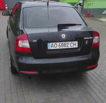 Шкода Октавия 2011 в Ужгороде на Automoto.ua Черный Шкода Октавия, объемом двигателя 1.6 л и пробегом 270 тыс. км за 7200 $, фото 14 на Automoto.ua