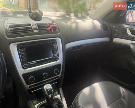 Черный Шкода Октавия, объемом двигателя 1.6 л и пробегом 217 тыс. км за 9100 $, фото 1 на Automoto.ua