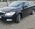 Черный Шкода Октавия, объемом двигателя 1.8 л и пробегом 236 тыс. км за 9000 $, фото 1 на Automoto.ua