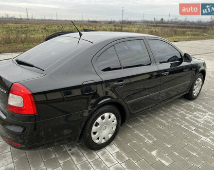 Черный Шкода Октавия, объемом двигателя 1.6 л и пробегом 195 тыс. км за 7500 $, фото 1 на Automoto.ua