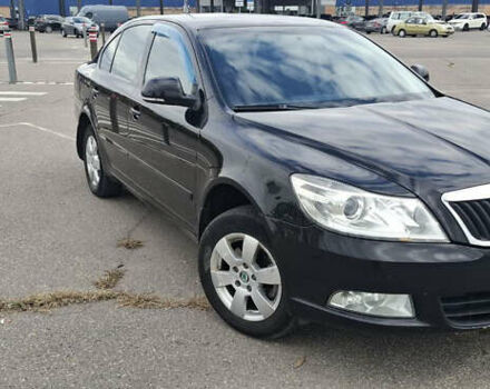 Черный Шкода Октавия, объемом двигателя 1.8 л и пробегом 236 тыс. км за 9000 $, фото 1 на Automoto.ua