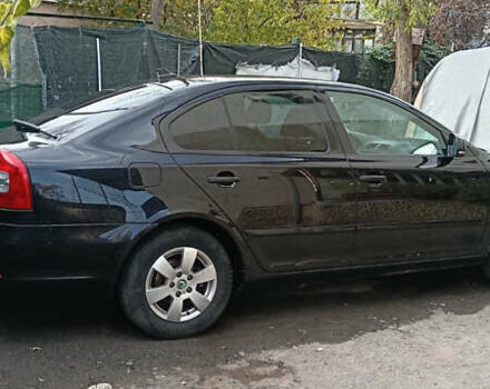 Черный Шкода Октавия, объемом двигателя 1.6 л и пробегом 220 тыс. км за 11500 $, фото 1 на Automoto.ua