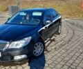 Черный Шкода Октавия, объемом двигателя 1.6 л и пробегом 221 тыс. км за 8899 $, фото 1 на Automoto.ua
