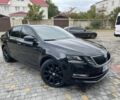 Черный Шкода Октавия, объемом двигателя 2 л и пробегом 240 тыс. км за 14999 $, фото 1 на Automoto.ua