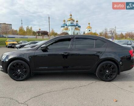 Чорний Шкода Октавія, об'ємом двигуна 1.8 л та пробігом 165 тис. км за 16500 $, фото 9 на Automoto.ua