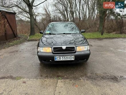 Черный Шкода Октавия, объемом двигателя 1.6 л и пробегом 235 тыс. км за 3450 $, фото 1 на Automoto.ua