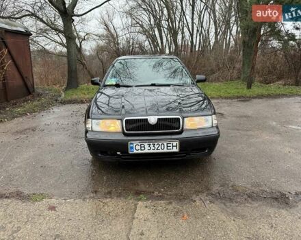 Черный Шкода Октавия, объемом двигателя 1.6 л и пробегом 235 тыс. км за 3450 $, фото 1 на Automoto.ua