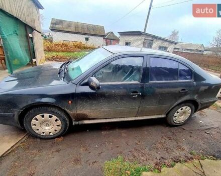 Черный Шкода Октавия, объемом двигателя 1.6 л и пробегом 300 тыс. км за 2800 $, фото 1 на Automoto.ua