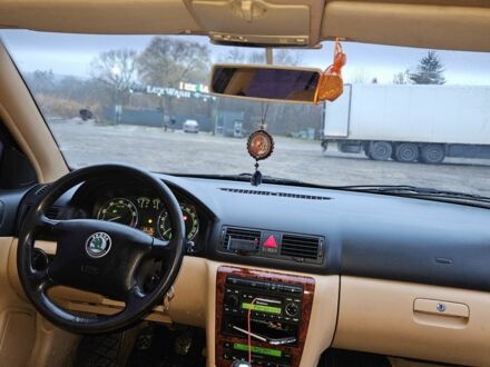 Черный Шкода Октавия, объемом двигателя 1.8 л и пробегом 390 тыс. км за 3999 $, фото 1 на Automoto.ua