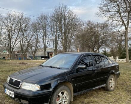 Черный Шкода Октавия, объемом двигателя 1.6 л и пробегом 246 тыс. км за 5200 $, фото 1 на Automoto.ua