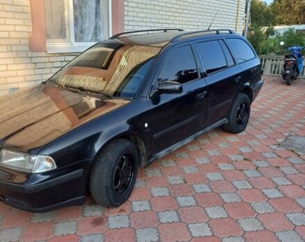 Черный Шкода Октавия, объемом двигателя 1.9 л и пробегом 333 тыс. км за 3500 $, фото 1 на Automoto.ua