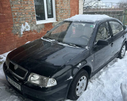 Черный Шкода Октавия, объемом двигателя 1.6 л и пробегом 245 тыс. км за 3400 $, фото 1 на Automoto.ua