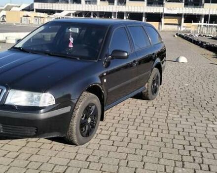 Черный Шкода Октавия, объемом двигателя 1.6 л и пробегом 287 тыс. км за 3900 $, фото 1 на Automoto.ua