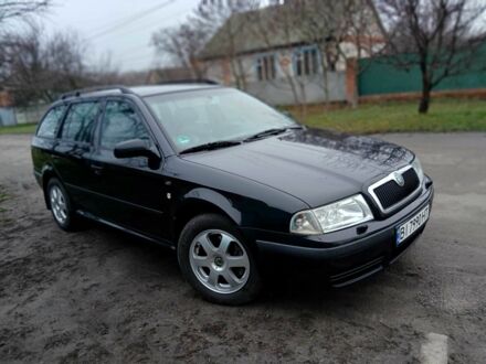 Черный Шкода Октавия, объемом двигателя 1.8 л и пробегом 200 тыс. км за 5500 $, фото 1 на Automoto.ua