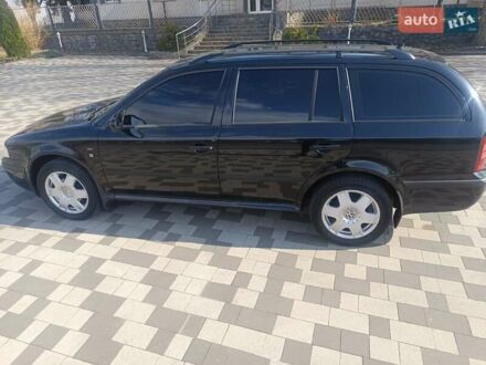 Черный Шкода Октавия, объемом двигателя 1.6 л и пробегом 295 тыс. км за 4300 $, фото 1 на Automoto.ua