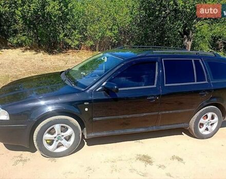 Черный Шкода Октавия, объемом двигателя 1.9 л и пробегом 290 тыс. км за 4000 $, фото 1 на Automoto.ua