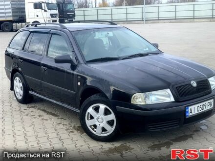 Черный Шкода Октавия, объемом двигателя 1.6 л и пробегом 435 тыс. км за 4099 $, фото 1 на Automoto.ua