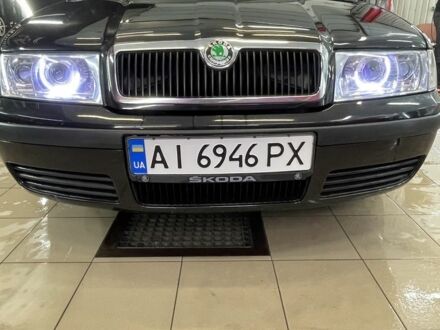 Черный Шкода Октавия, объемом двигателя 2 л и пробегом 275 тыс. км за 4800 $, фото 1 на Automoto.ua