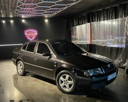 Черный Шкода Октавия, объемом двигателя 2 л и пробегом 401 тыс. км за 4400 $, фото 1 на Automoto.ua