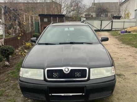 Черный Шкода Октавия, объемом двигателя 1.6 л и пробегом 227 тыс. км за 4200 $, фото 1 на Automoto.ua