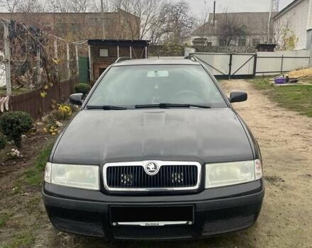 Черный Шкода Октавия, объемом двигателя 1.6 л и пробегом 227 тыс. км за 4200 $, фото 1 на Automoto.ua