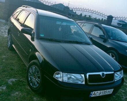 Черный Шкода Октавия, объемом двигателя 1.6 л и пробегом 220 тыс. км за 4874 $, фото 1 на Automoto.ua
