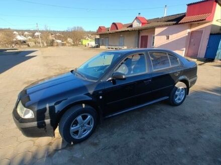 Черный Шкода Октавия, объемом двигателя 1.6 л и пробегом 238 тыс. км за 5000 $, фото 1 на Automoto.ua