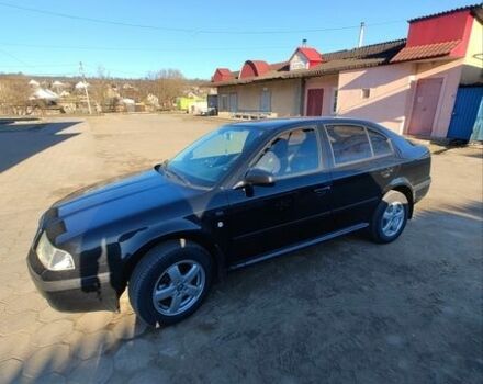 Черный Шкода Октавия, объемом двигателя 1.6 л и пробегом 238 тыс. км за 5000 $, фото 1 на Automoto.ua