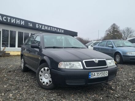 Черный Шкода Октавия, объемом двигателя 1.6 л и пробегом 155 тыс. км за 4450 $, фото 1 на Automoto.ua