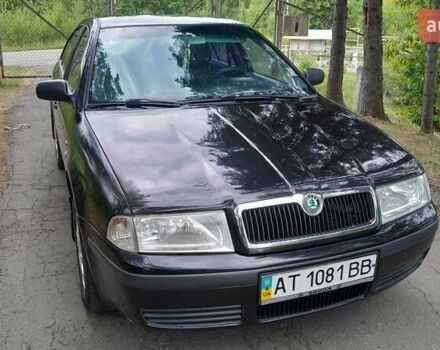 Черный Шкода Октавия, объемом двигателя 1.6 л и пробегом 230 тыс. км за 3900 $, фото 1 на Automoto.ua