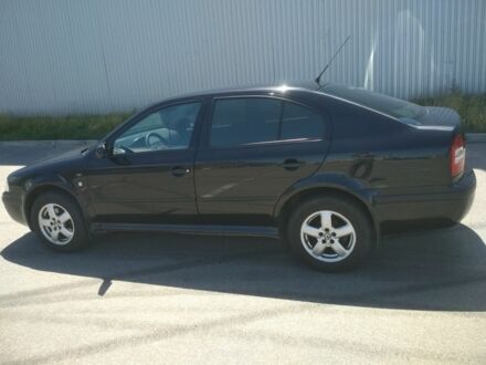 Черный Шкода Октавия, объемом двигателя 2 л и пробегом 212 тыс. км за 4600 $, фото 1 на Automoto.ua